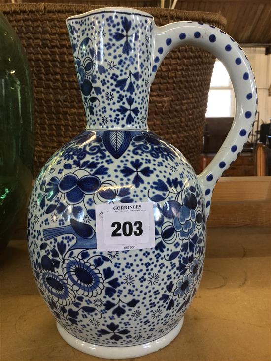 A Delft blue and white jug, 18/19th century(-)